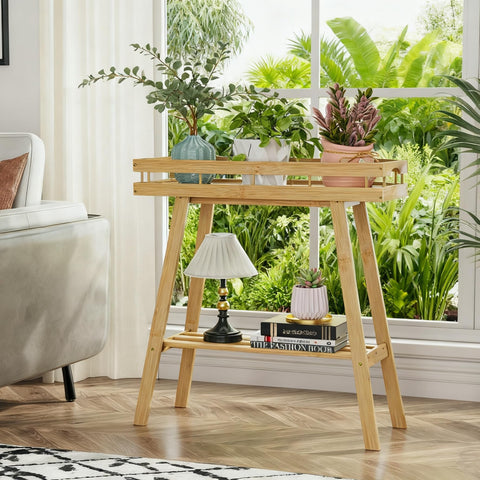 BAMBANG plant stand on a window sill enhances sunlight and plant visibility.
