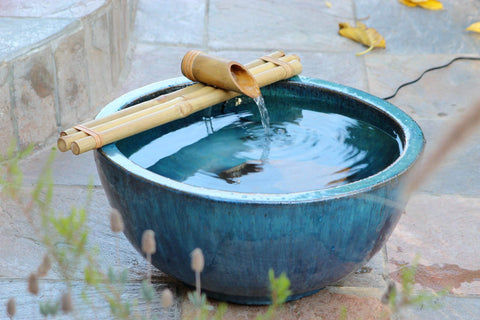 Bamboo Accents handcrafted bamboo finish on outdoor fountain piece.