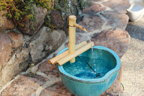 Bamboo Accents indoor/outdoor water feature complements bowls and décor.