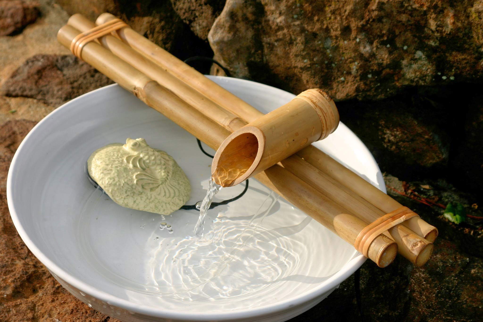 Bamboo Accents zen garden patio water feature for calm ambiance.