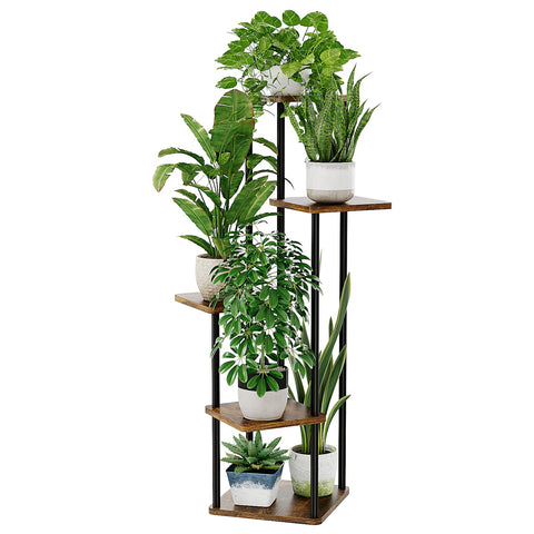 Bamworld tall plant stand multi-tier showcases plants in a bright living room corner.