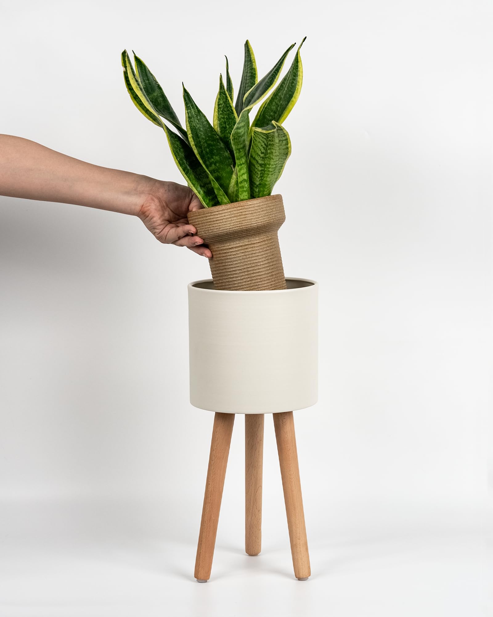 Bamworld white plant stand with metal planter showcases a sleek, versatile indoor decor piece.
