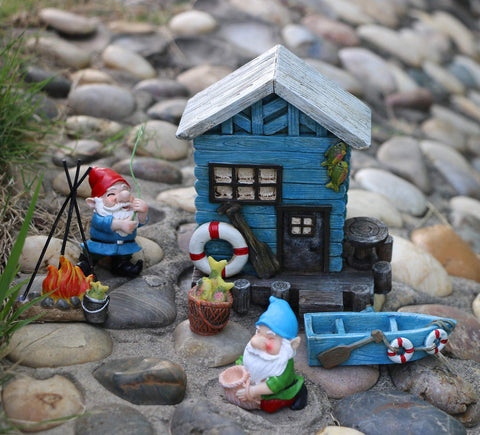 BangBangDa gnome fish barrel adds nautical whimsy to garden borders.