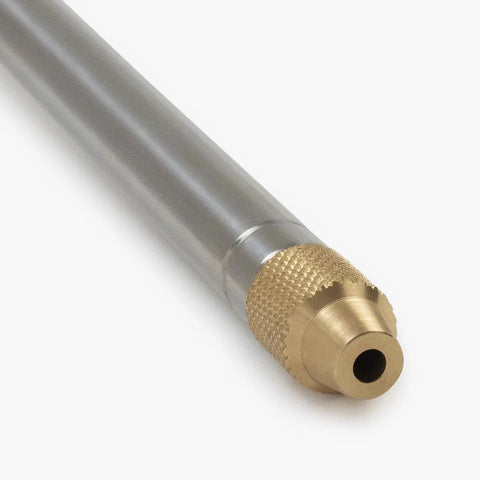 Barebones fire blower with one-way valve reduces smoke exposure during tending.