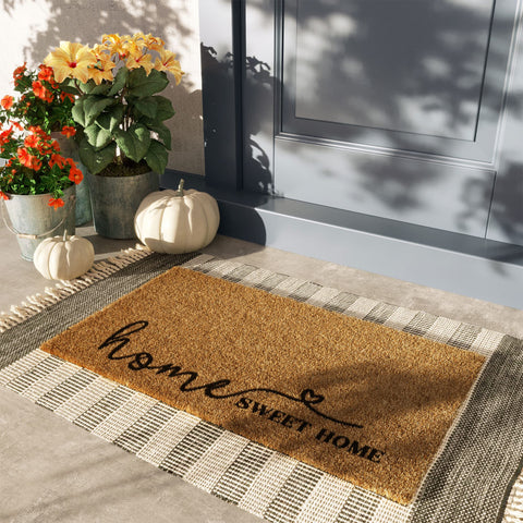 Barnyard Designs brown outdoor doormat, textured surface ready for porch use