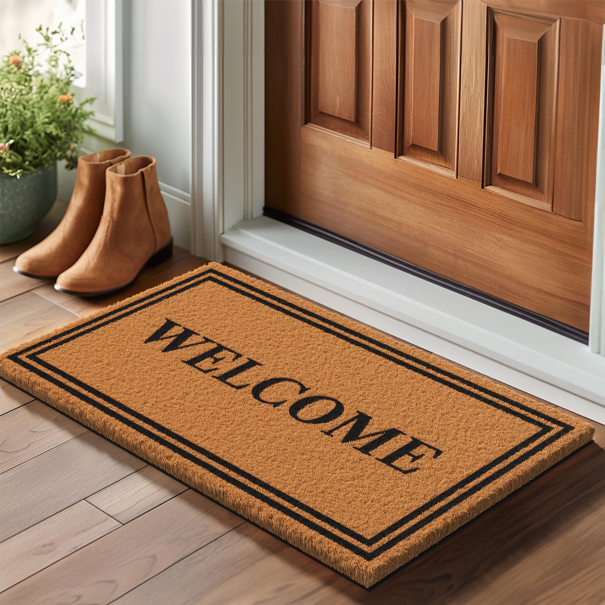 Barnyard Designs brown 30x17 welcome mat for outdoor entry.