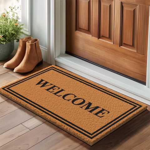Barnyard Designs brown 30x17 welcome mat for outdoor entry.