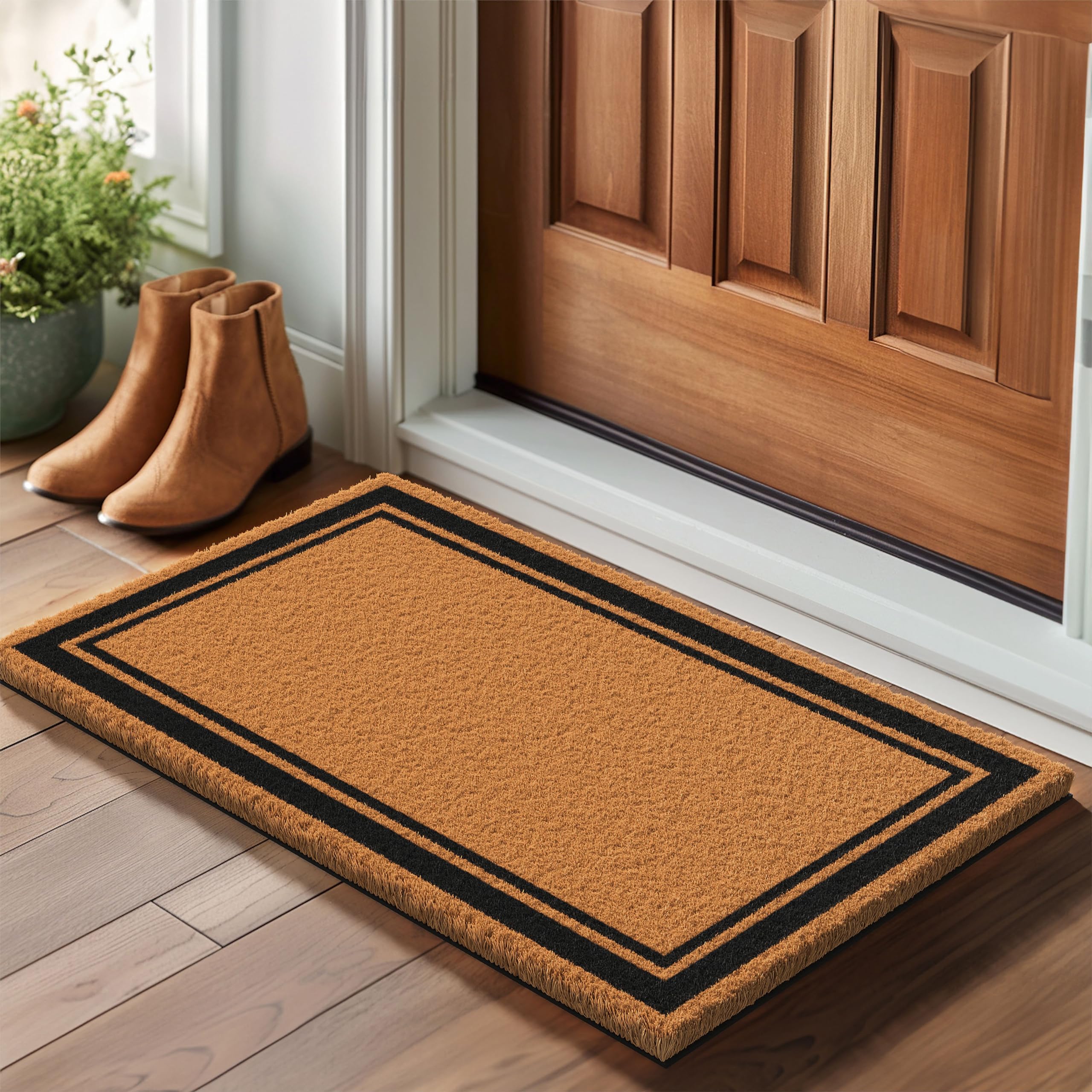 Barnyard Designs brown border doormat front door in use for welcoming guests.