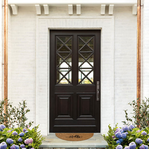 Barnyard Designs mat with non-slip backing secures position on exterior stairs.