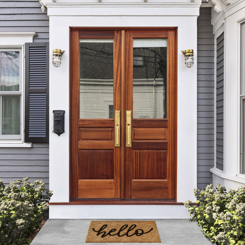 Barnyard Designs Hello doormat close-up; non-slip backing keeps entrances secure.
