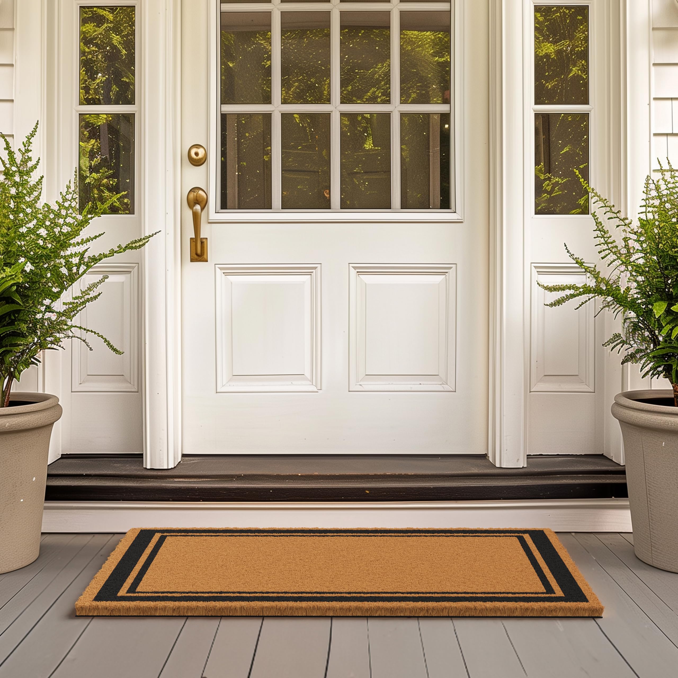 Barnyard Designs wide entryway 24x36 doormat placed on an outdoor porch
