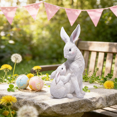basen white Easter bunny decor blends with flowers for seasonal displays.