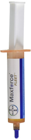 Syringe applies Bayer Max Force Fleet gel into cracks for targeted indoor control.