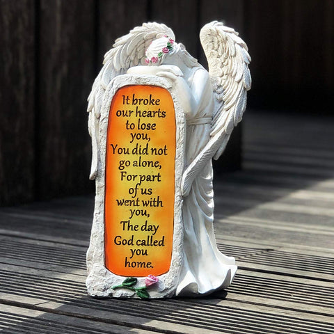 BAYN guardian angel statue with garland adds peaceful charm to gardens