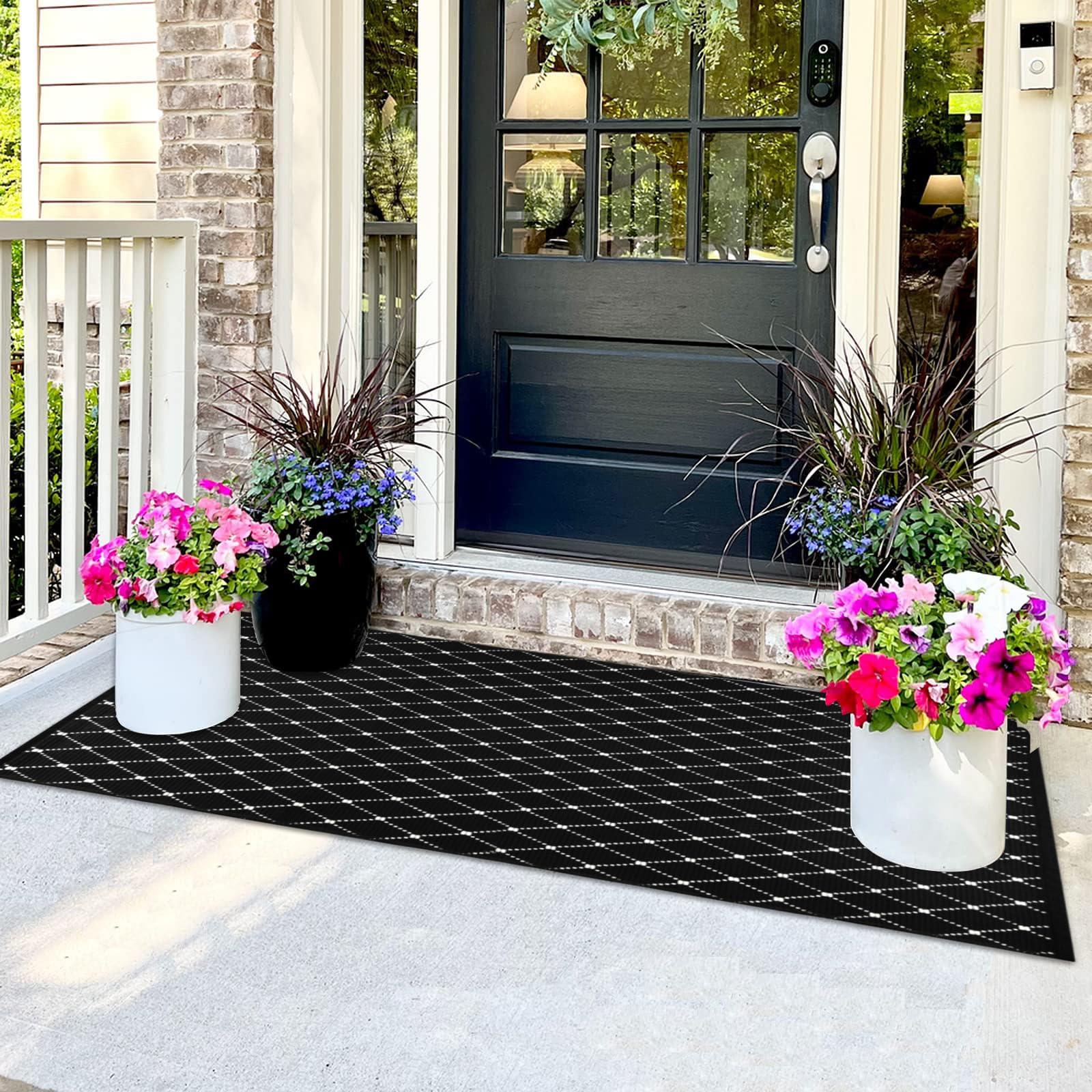 Bazasa front porch rug in black boho style enhances outdoor entry with durable, welcoming appeal.