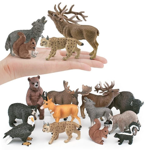 Lynx figurines used as cake toppers for celebrations.