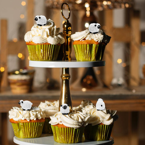 Bbiamsleep miniature sheep toppers enhance rustic birthday cake displays.