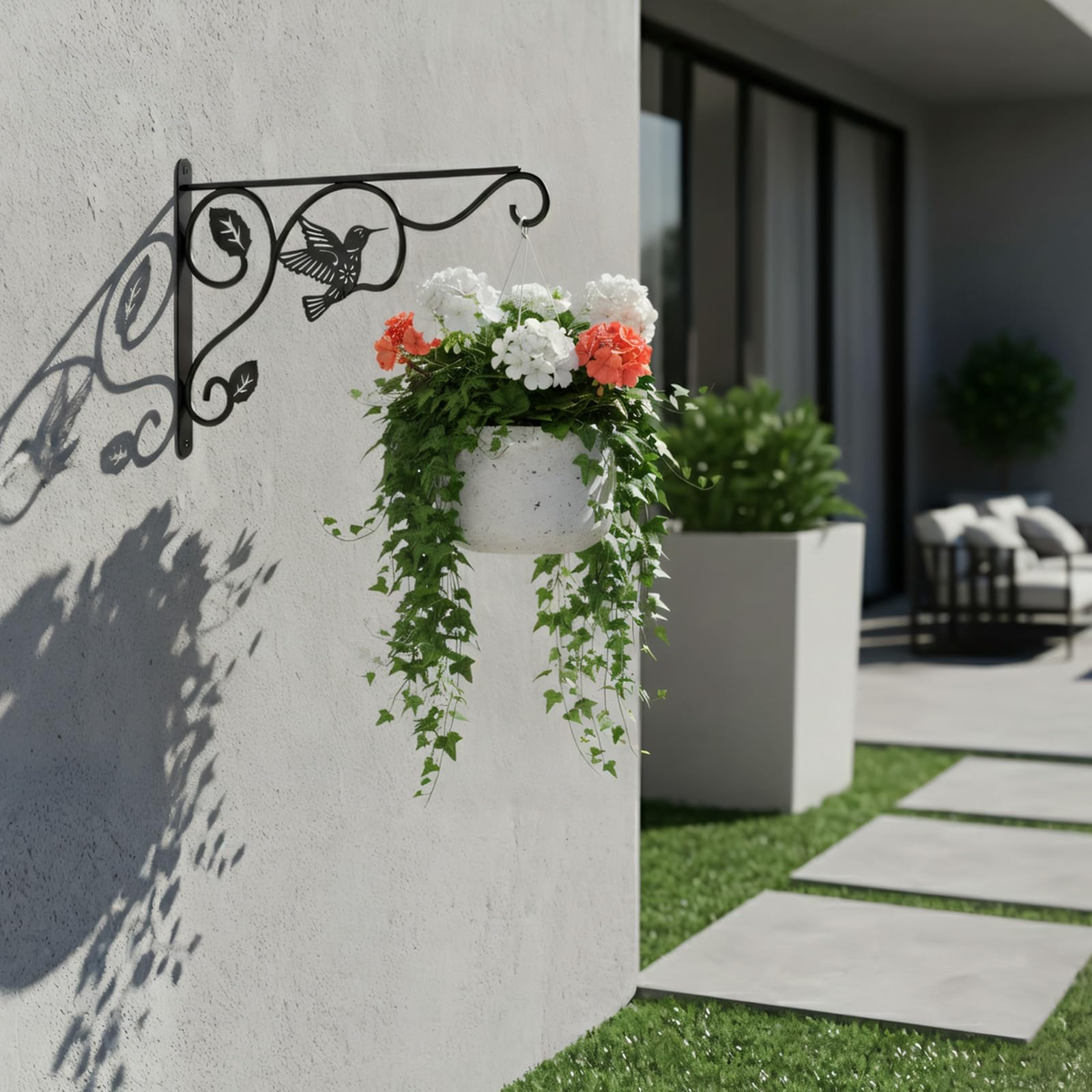 BBTFAA wall-mount hook with decorative bird design on garden wall.