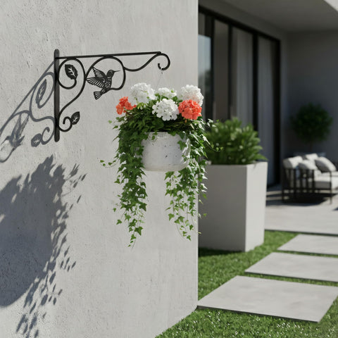 BBTFAA wall-mount hook with decorative bird design on garden wall.