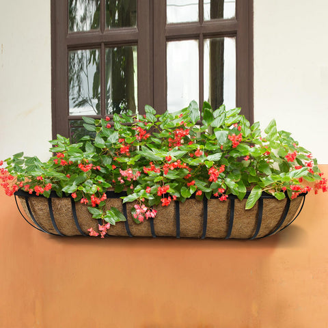 BeapTcely large balcony planter enhances outdoor garden aesthetics on a railing.