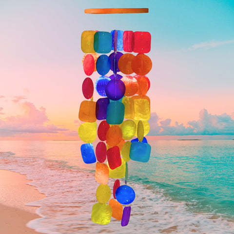 Bellaa wind chimes above garden path evoke coastal charm and calm