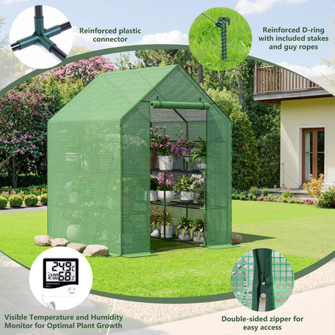 Benass greenhouse anchored with ground stakes and ropes for wind resistance.