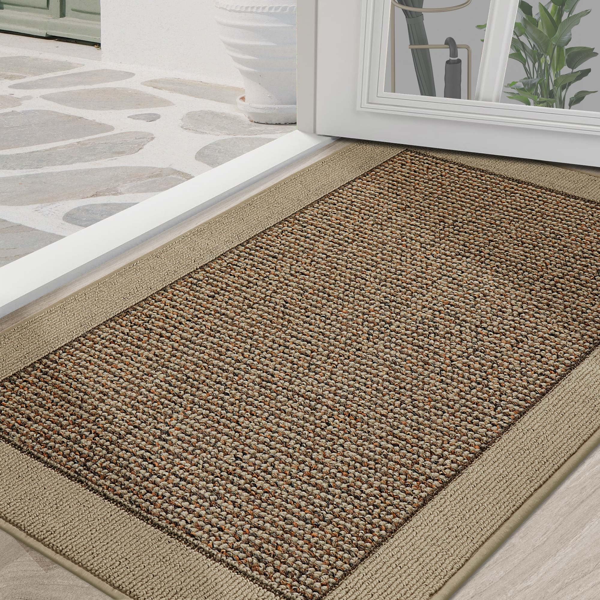 BEQHAUSE door mat at the front door traps dirt and moisture for quick cleanups.