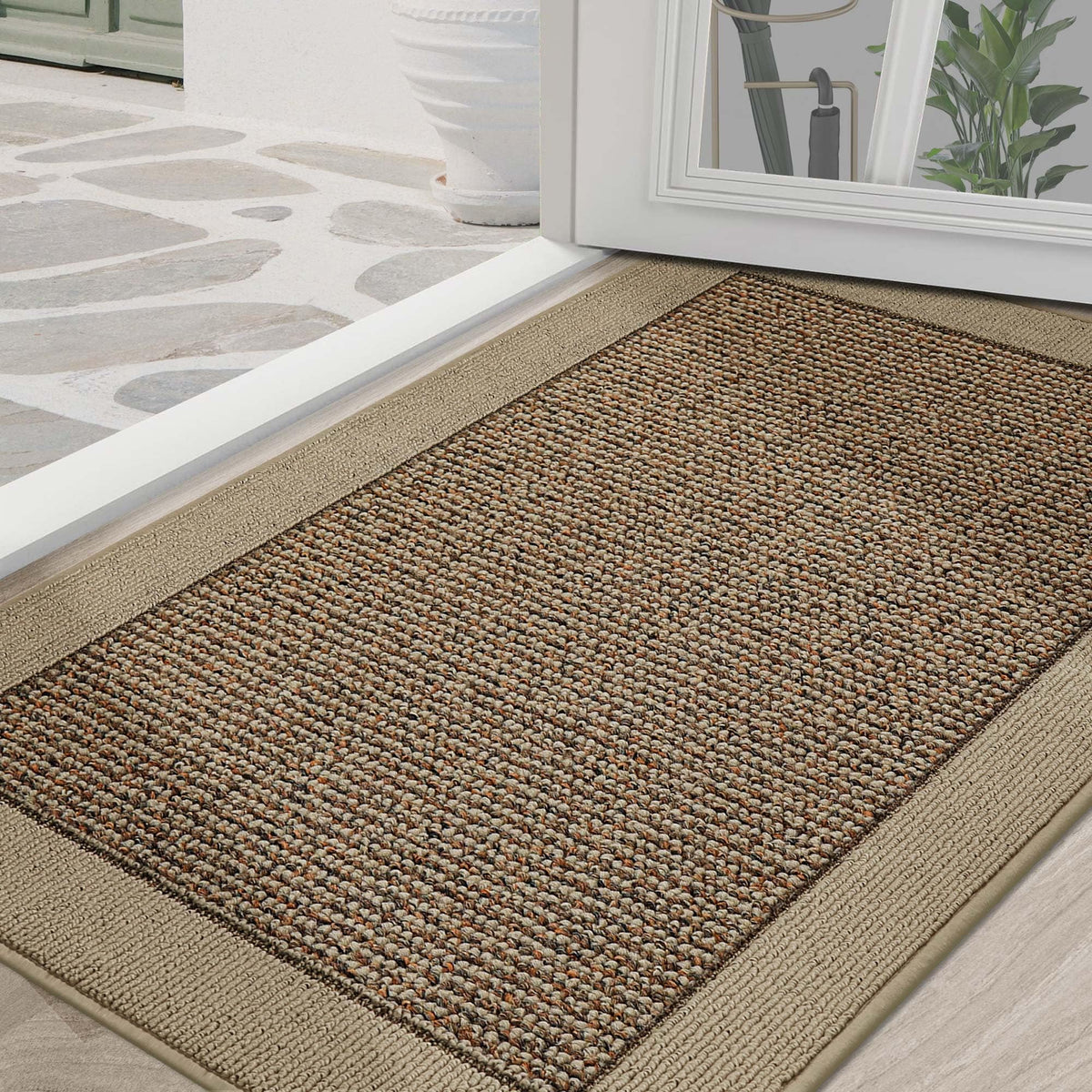 BEQHAUSE door mat at the front door traps dirt and moisture for quick cleanups.
