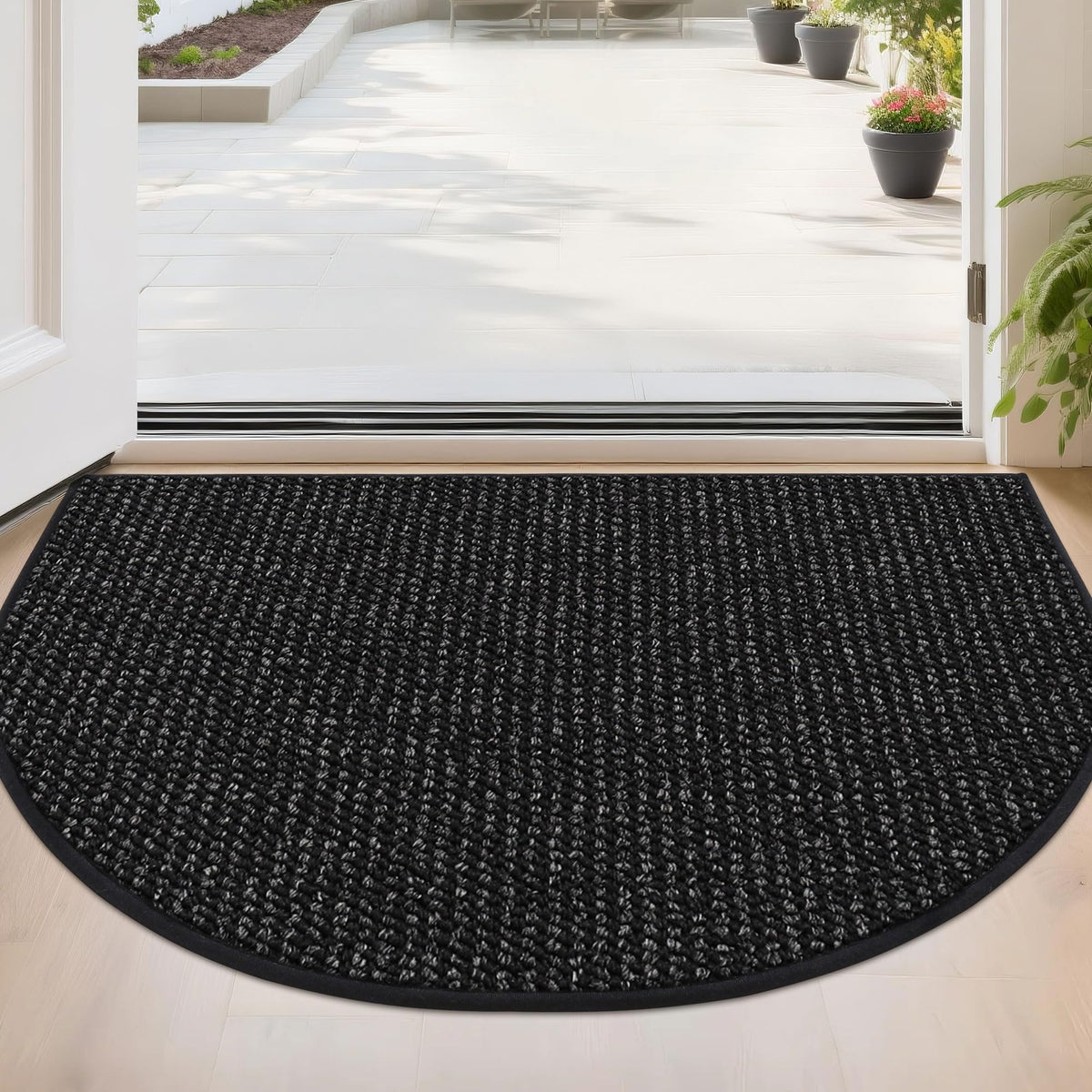 BEQHAUSE Dirt Trapper door mat in half-circle traps dirt at the doorway.