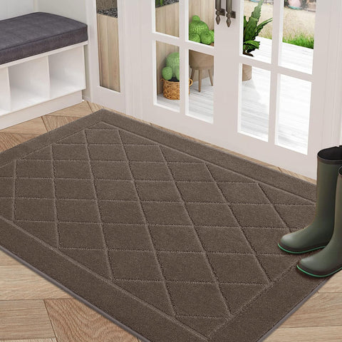 BEQHAUSE Dirt Trapper mat for front door captures moisture, keeping entryways clean.