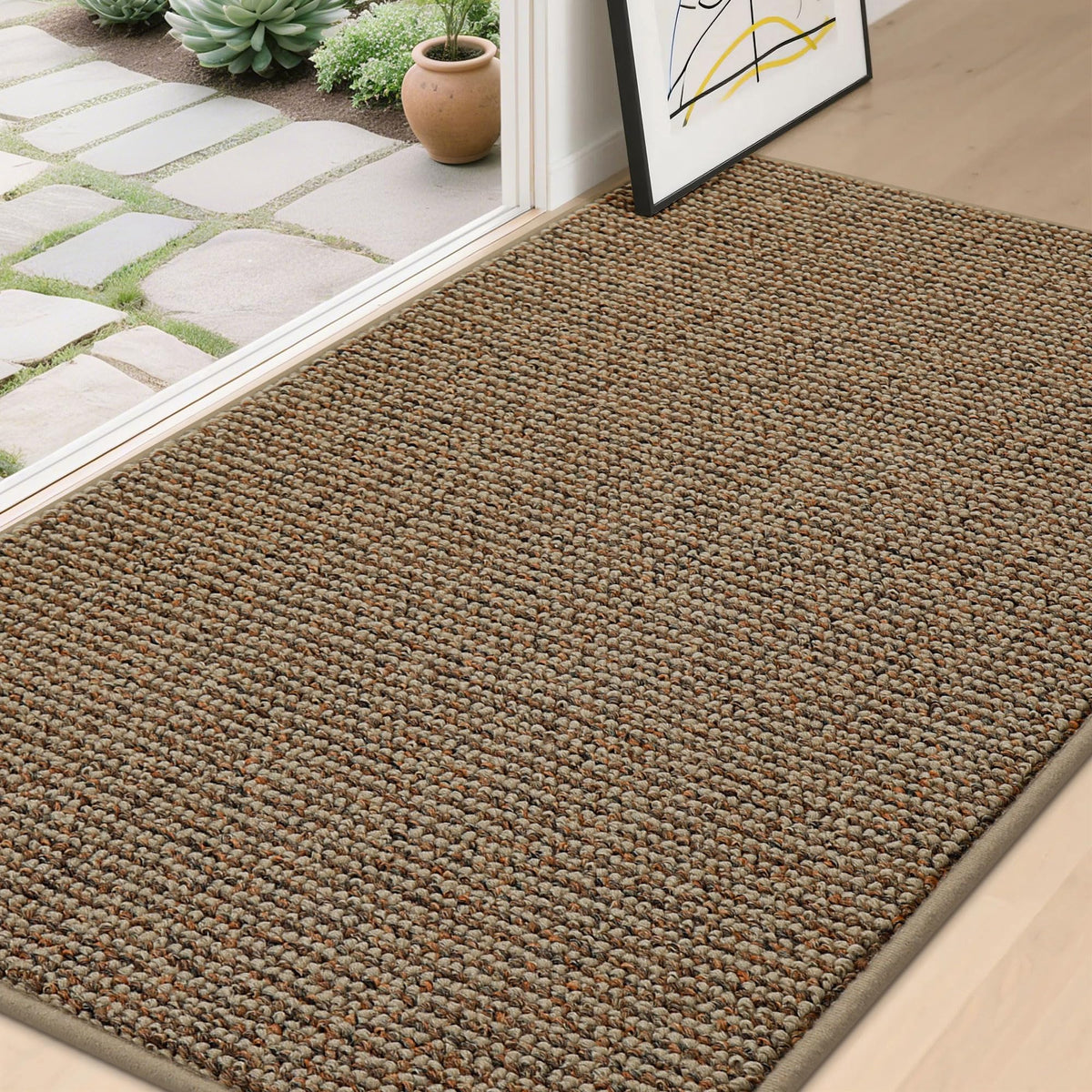 BEQHAUSE Dirt Trapper mat front door view traps dirt and moisture to protect floors.