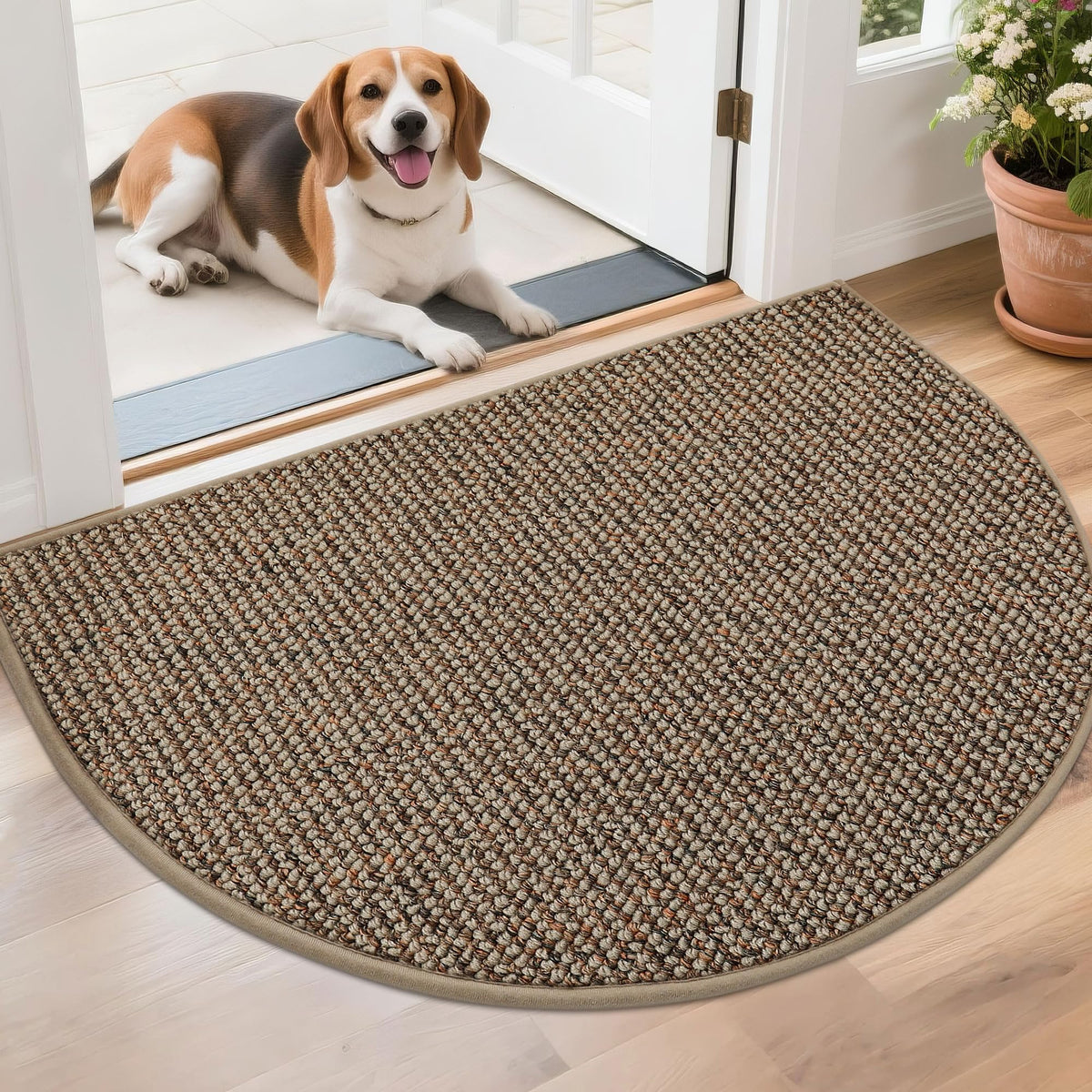 BEQHAUSE dirt trapper half-circle mat catching dirt at the doorstep.