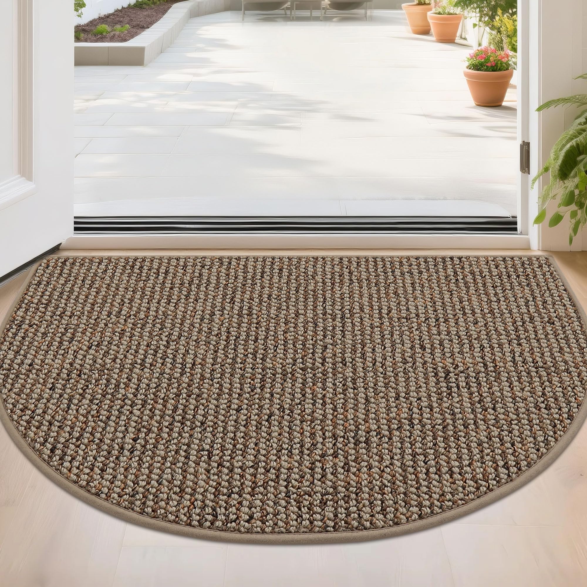 BEQHAUSE Dirt Trapper semi-circle mat captures dirt at the entrance.