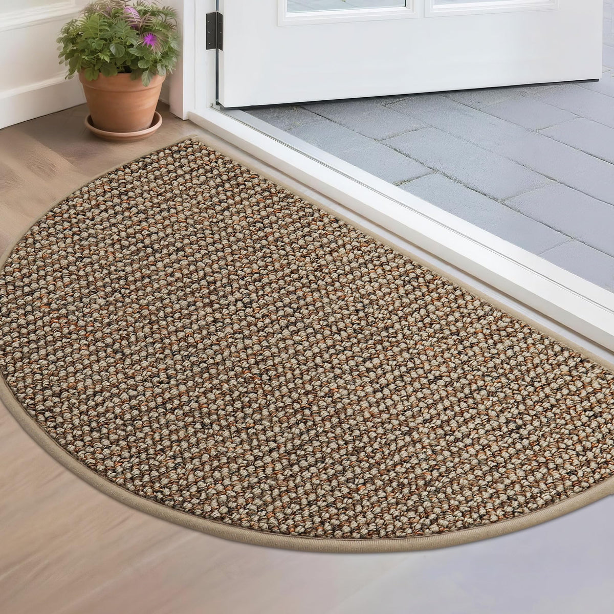 BEQHAUSE Dirt Trapper front door mat traps dirt and moisture for clean entryways.