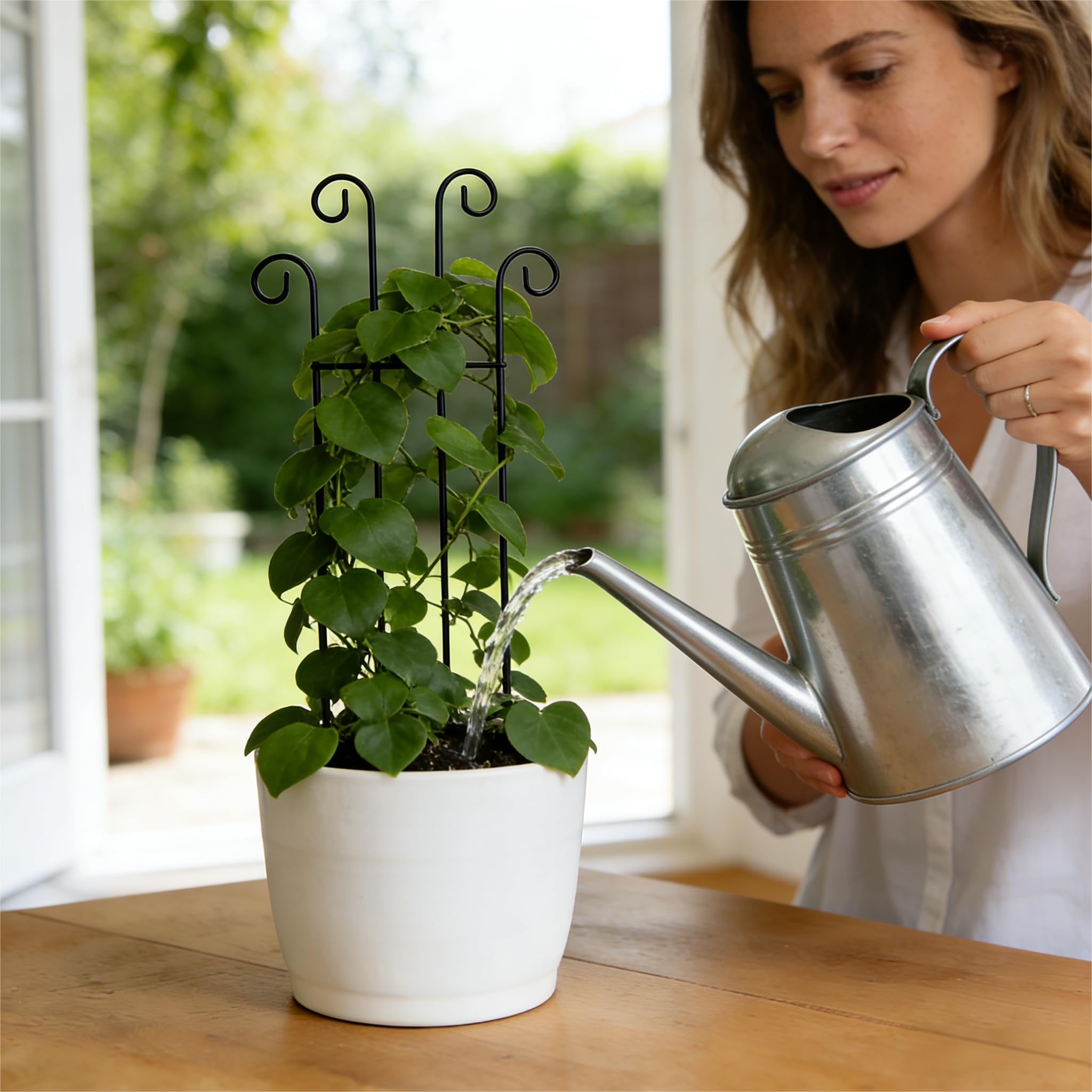 Berallo powder-coated iron resists rust for durable garden decor