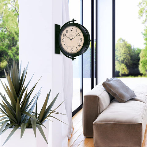 Bestime 66264B wall clock mounted in a lobby highlighting vintage farmhouse style.
