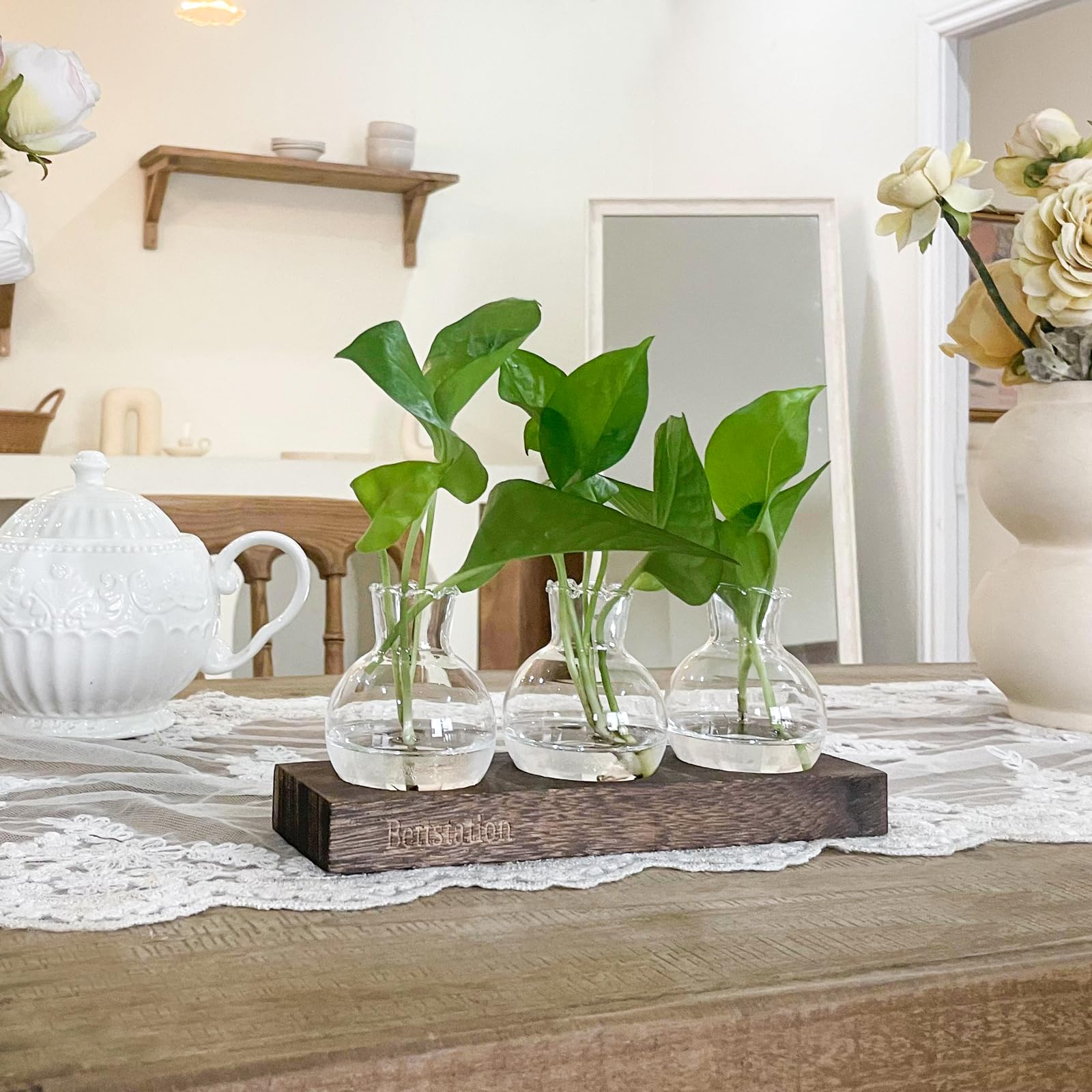 Bettstation easy-assembly kit with included glass vases and stand.