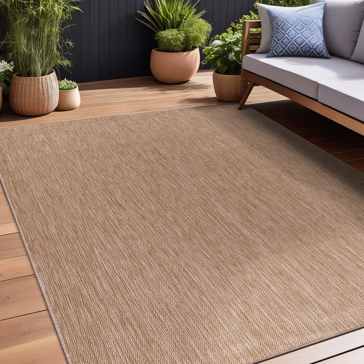 Beverly Rug 9x12 beige outdoor rug under patio furniture, stylish and weather-ready.