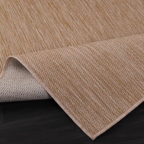 Beverly Rug weather-resistant polypropylene rug standing up to sun and rain.