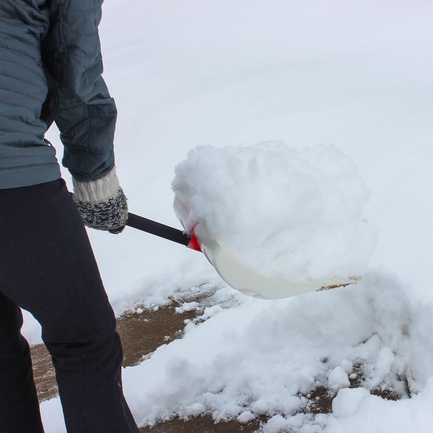 Bigfoot metal-handle snow shovel shows durable steel-core handle for heavy-duty shoveling.