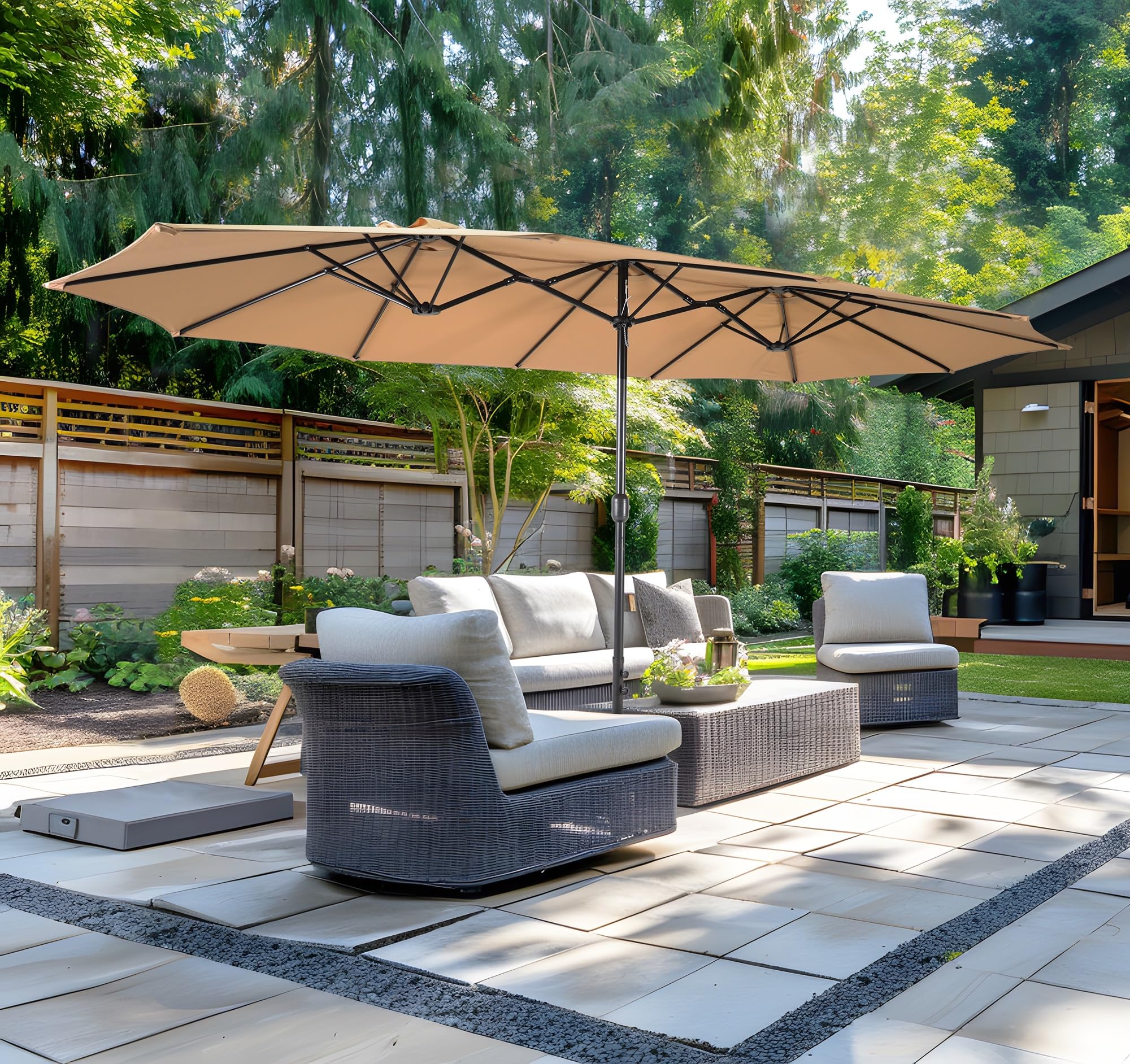 Base with sandbags stabilizing the Bigroof umbrella on a patio