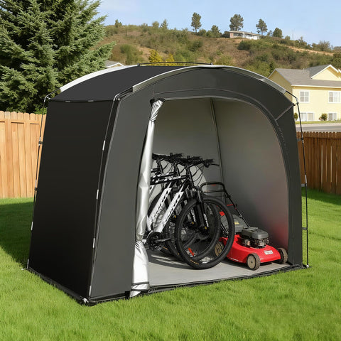 Bike Tent storing bikes and yard tools under shelter.