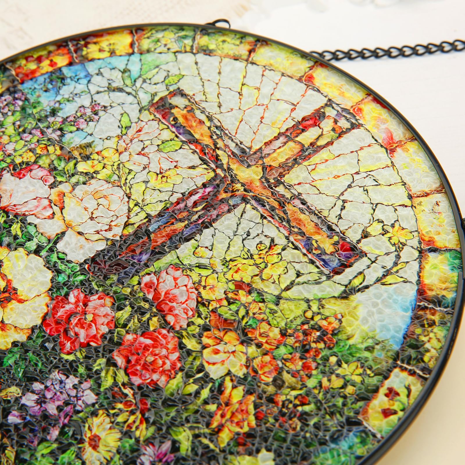 Bingcute cross suncatcher creates a warm glow in entryways