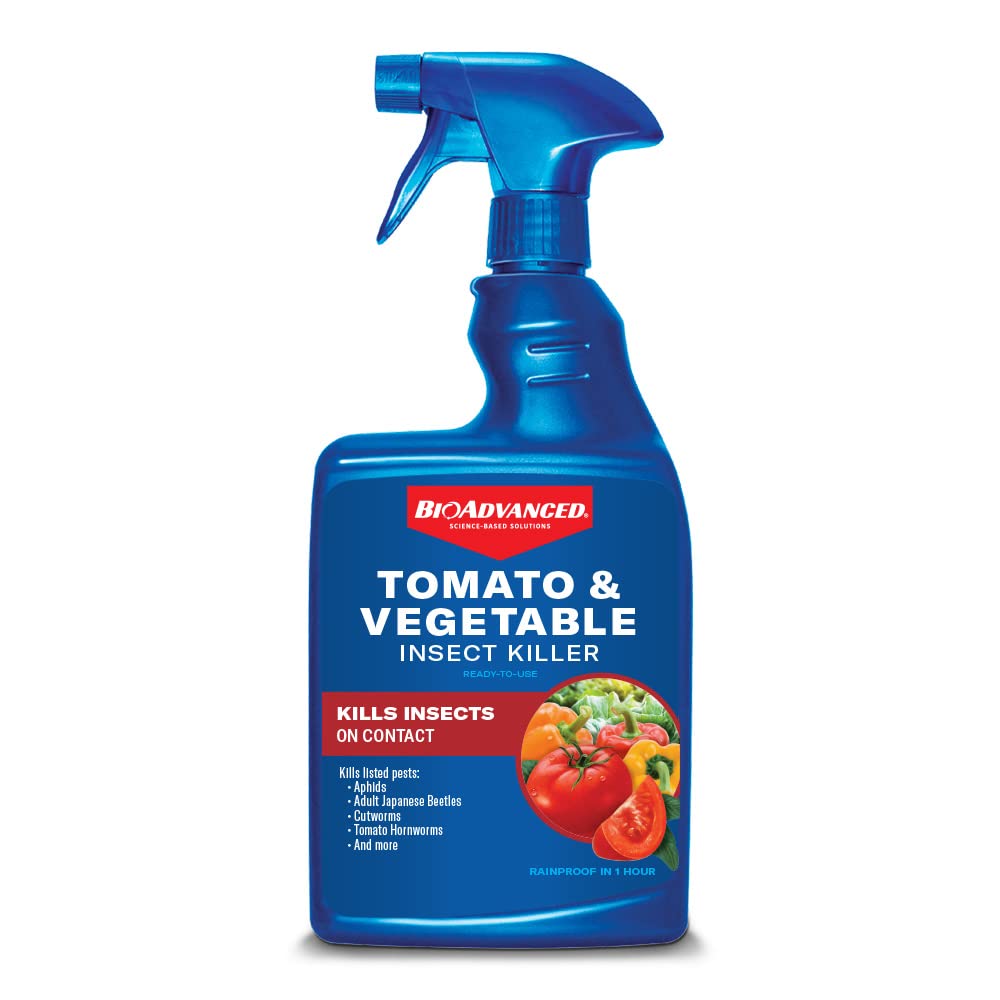 BioAdvanced Tomato & Vegetable Pest Control bottle ready for outdoor use, protecting crops.