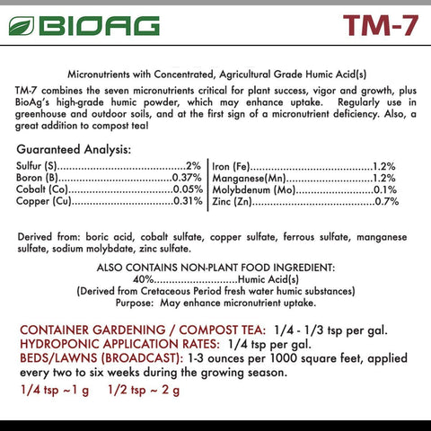 BioAg TM-7 being spread on soil for even nutrient distribution.