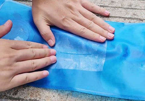 Birllaid patch repairing a pool float for outdoor use