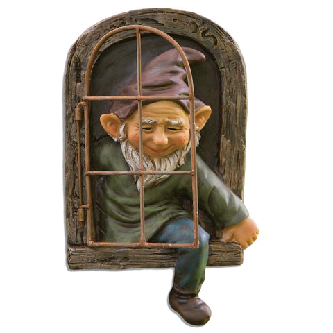 Bits and Pieces elf out the window yard decor adds whimsy to your garden.