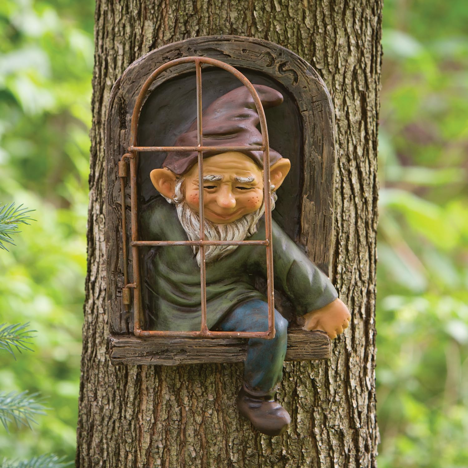 Bits and Pieces tree hugger elf close-up showcases detailed, hand-painted features.