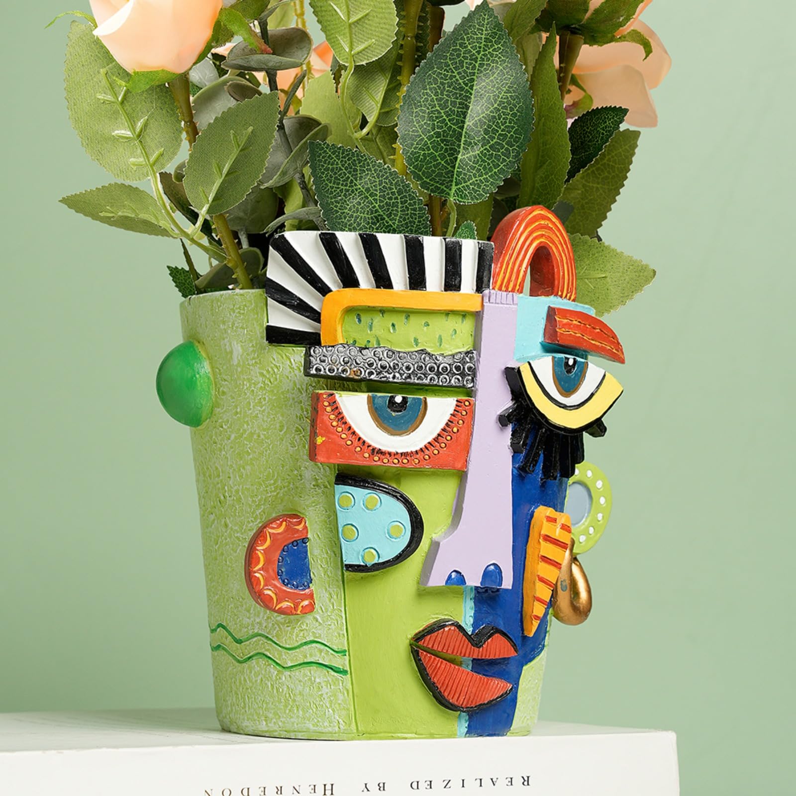 BJVF Picasso Face Planter brightens a desk with an artful plant display.