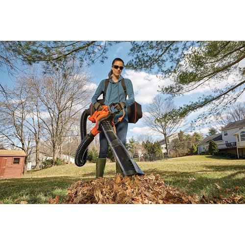 BLACK+DECKER BEBL7000 leaf vacuum action capturing leaves along a sidewalk.